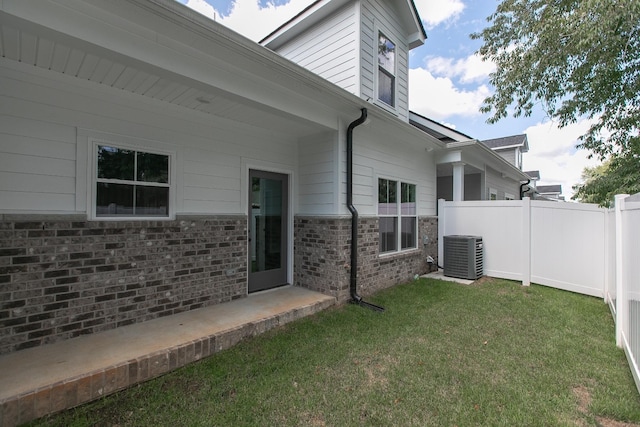 exterior space featuring central AC unit