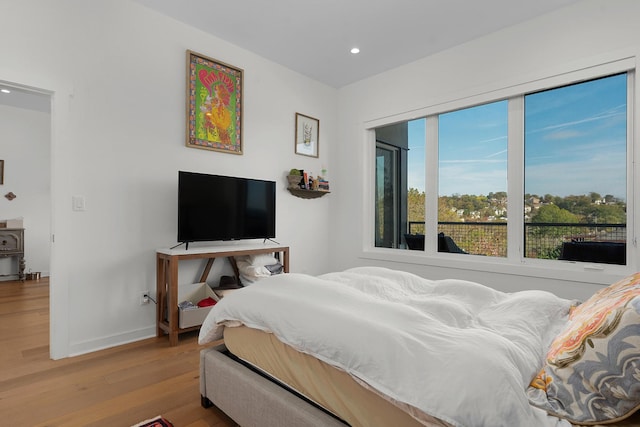 bedroom featuring hardwood / wood-style floors