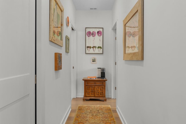 hall featuring hardwood / wood-style flooring