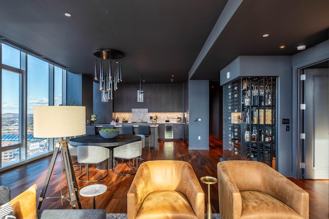 dining area featuring dark wood-type flooring