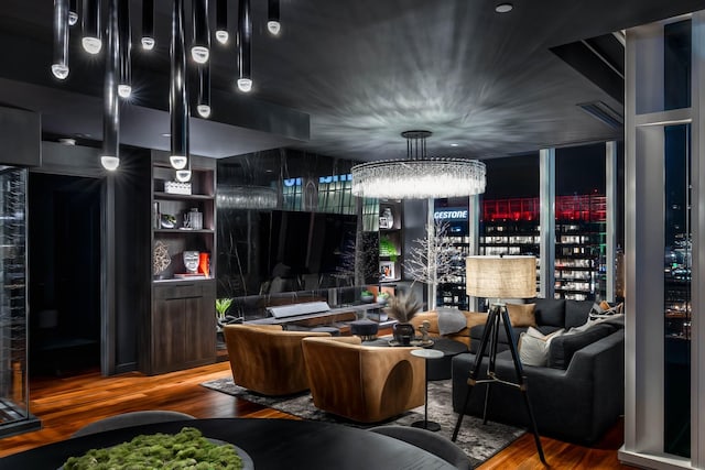 interior space with hardwood / wood-style flooring and an inviting chandelier