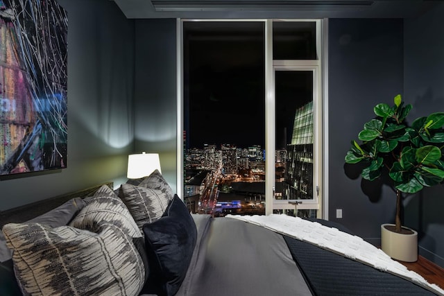 bedroom featuring wood-type flooring