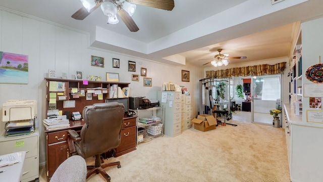 carpeted office with crown molding and ceiling fan