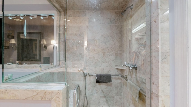 bathroom featuring tiled shower