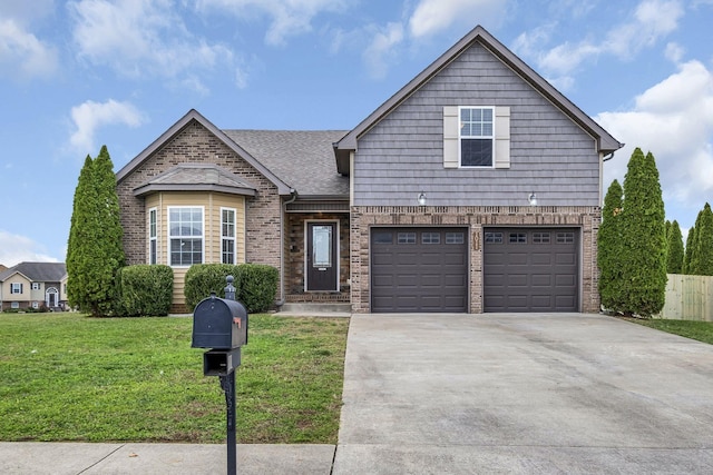 view of front facade with a garage and a front lawn