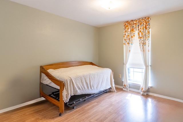 bedroom featuring light wood-type flooring