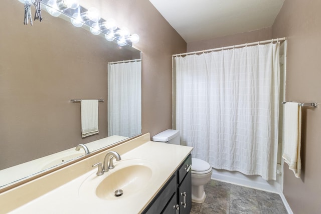 full bathroom featuring toilet, vanity, and shower / tub combo with curtain