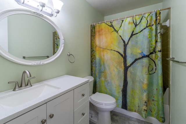 full bathroom with tile patterned floors, shower / bath combo with shower curtain, vanity, and toilet