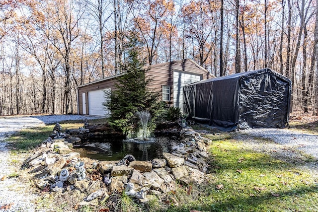 exterior space with a garage