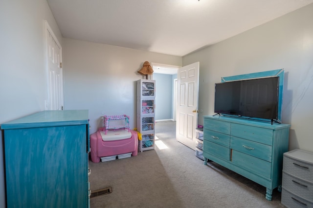 bedroom featuring carpet