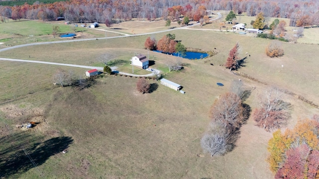 drone / aerial view with a rural view and a water view