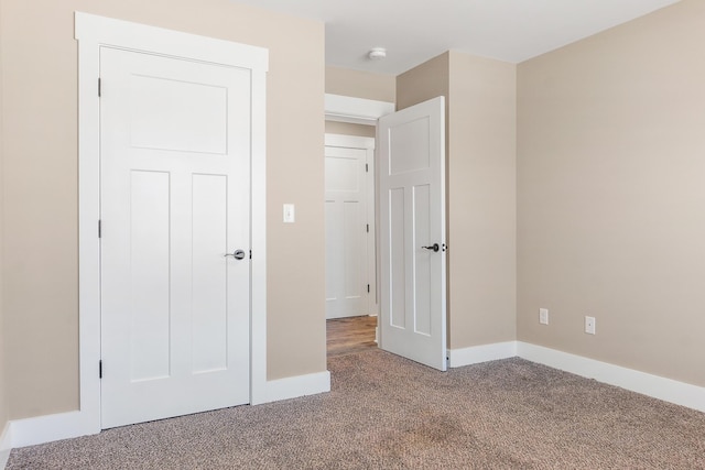 unfurnished bedroom featuring carpet floors