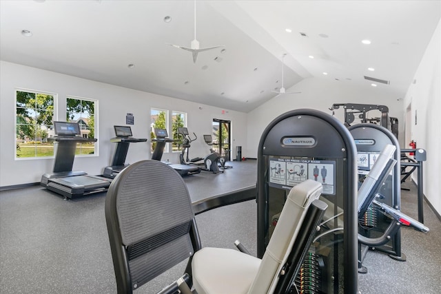 workout area featuring ceiling fan and lofted ceiling