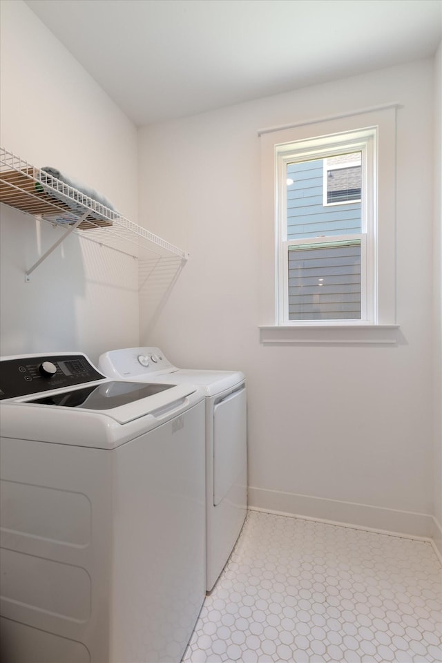 washroom with washer and clothes dryer