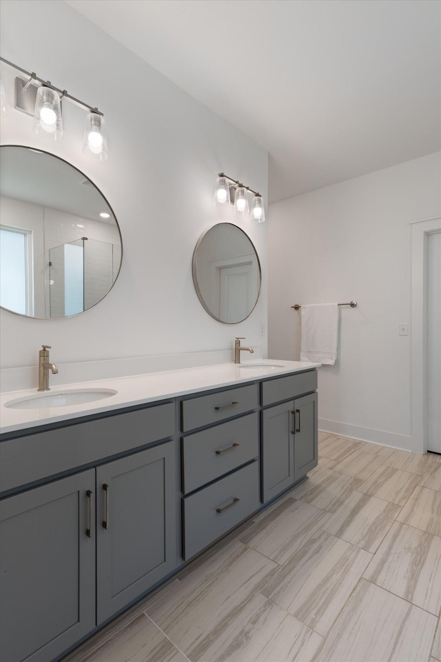 bathroom with vanity and walk in shower