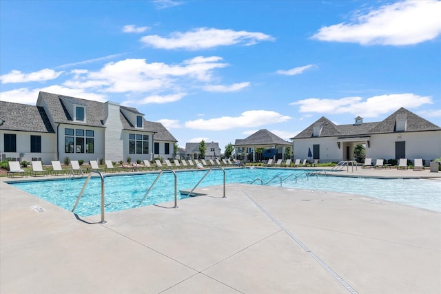 view of pool featuring a patio area