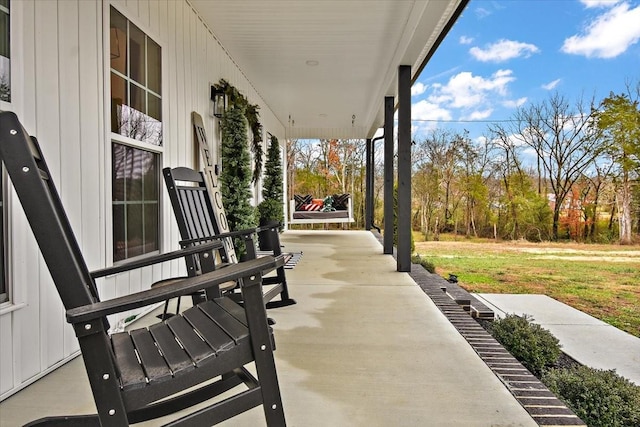 view of patio featuring a porch