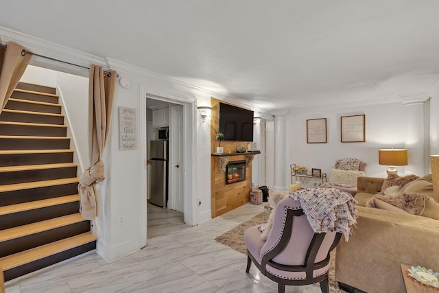 living room with ornamental molding