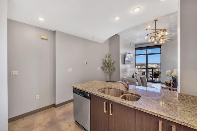 kitchen featuring light stone countertops, dark brown cabinets, sink, dishwasher, and a chandelier