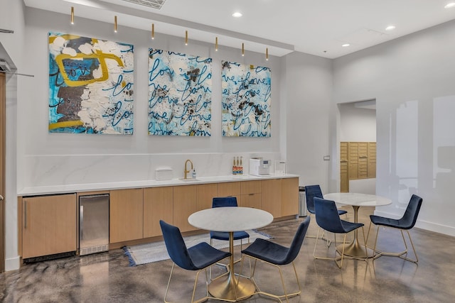 dining area featuring sink