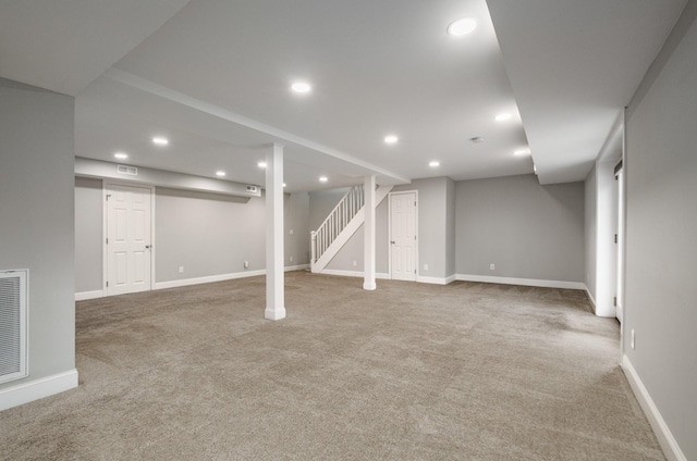 basement with carpet flooring