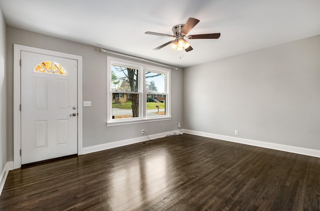 foyer entrance featuring ceiling fan and dark hardwood / wood-style flooring