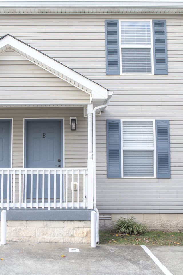 entrance to property with a porch