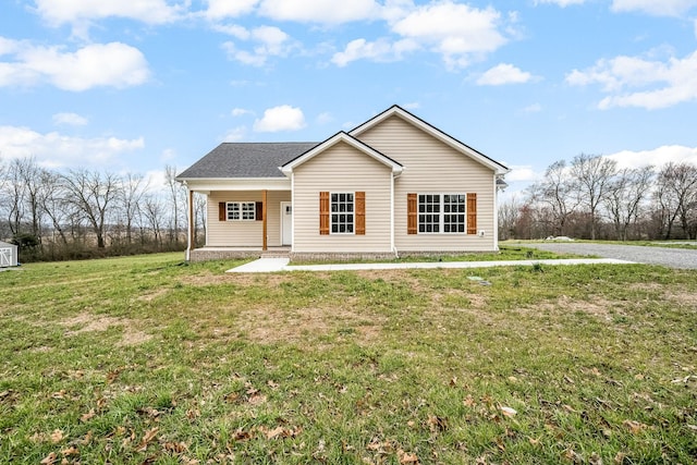 view of front of home featuring covered porch and a front lawn