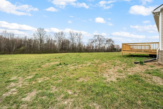 view of yard with a deck