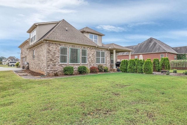 exterior space with a front lawn