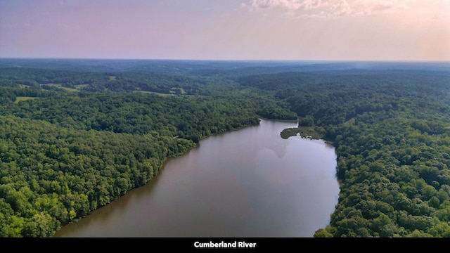 aerial view at dusk with a water view