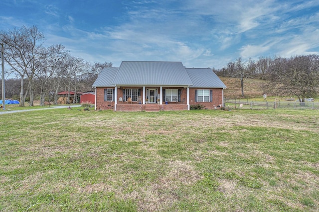 view of front of home featuring a porch and a front lawn