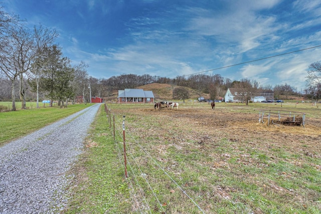 view of street featuring a rural view