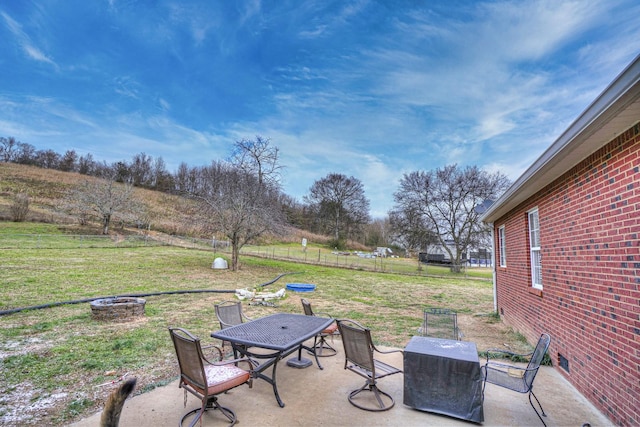 view of patio featuring a fire pit