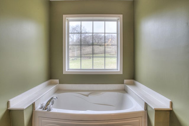 bathroom with a washtub