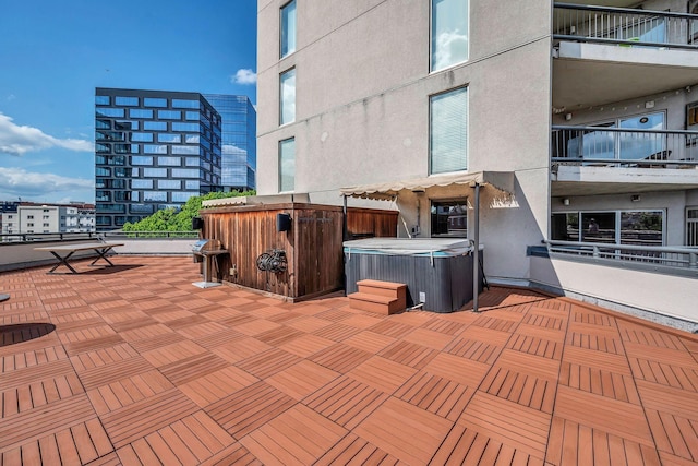 view of patio / terrace featuring a hot tub