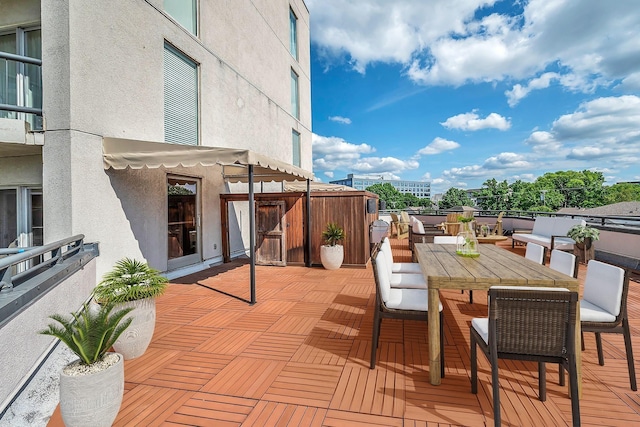 view of patio / terrace with a balcony