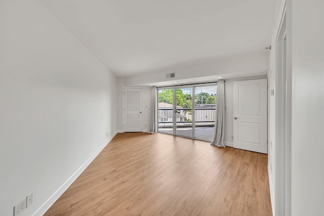 unfurnished room featuring light wood-type flooring