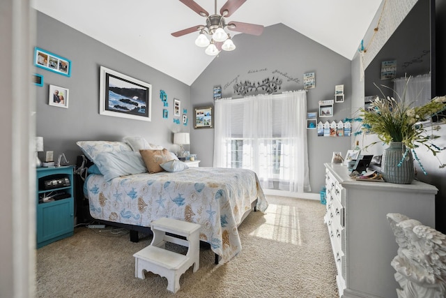 bedroom featuring light colored carpet, vaulted ceiling, and ceiling fan