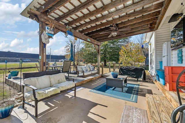 view of patio / terrace with grilling area, outdoor lounge area, and a ceiling fan