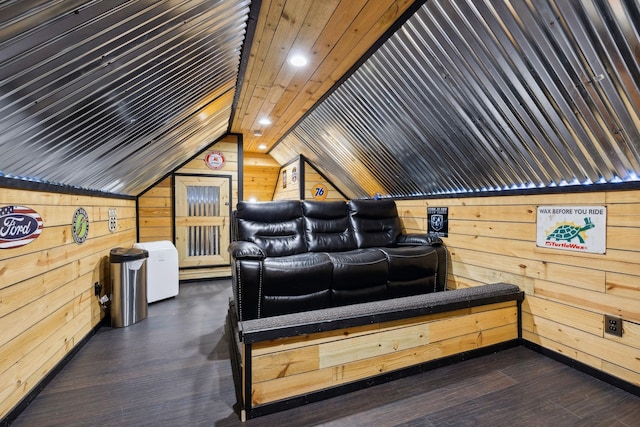 interior space featuring lofted ceiling, wooden ceiling, wooden walls, and dark wood-type flooring