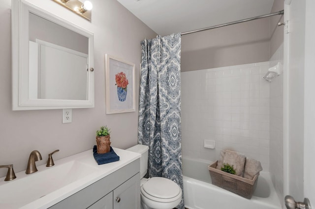 full bathroom with vanity, toilet, and shower / tub combo with curtain