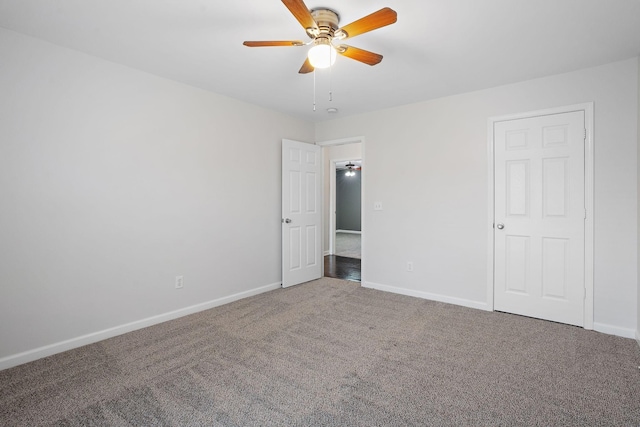 unfurnished bedroom featuring carpet flooring and ceiling fan