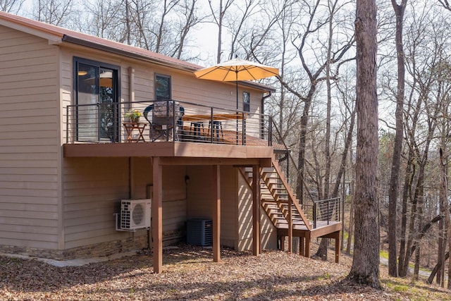 back of property with ac unit and cooling unit