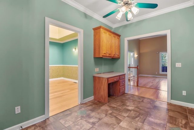 kitchen featuring ceiling fan, wood-type flooring, and ornamental molding