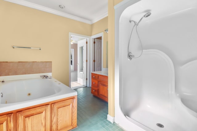 bathroom with tile patterned floors, vanity, ornamental molding, and shower with separate bathtub