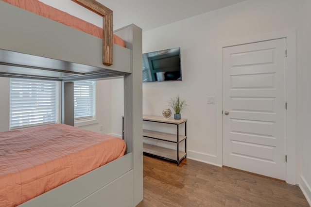 bedroom featuring wood-type flooring