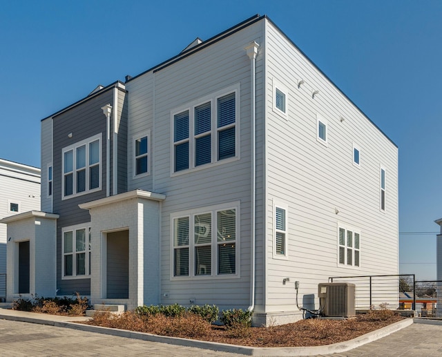 exterior space featuring central AC unit