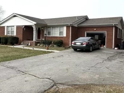 single story home with a garage