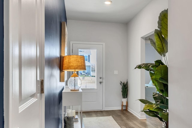 doorway with light hardwood / wood-style floors